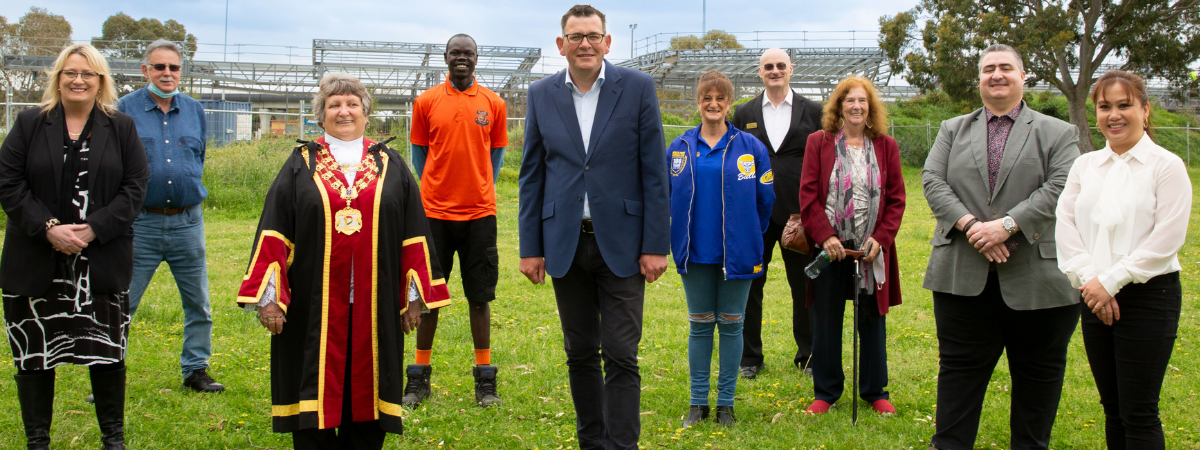 Photograph of Premier Daniel Andrews with Board Chair Lee Tarlamis OAM MP, City of Greater Dandenong Mayor, members of the Board and wider community