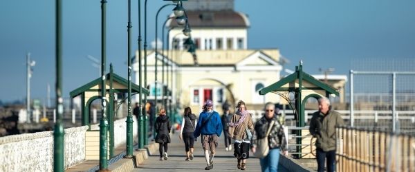 Pedestrians walking on St Kilda pier