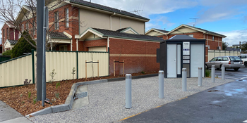 Newly completed carpark with gardens and public toilet.